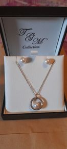 Matching pearl and 9k gold earrings ,pentant and chain