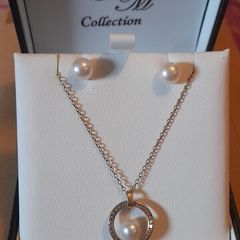 Matching pearl and 9k gold earrings ,pentant and chain