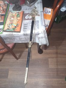 A Ceremonial Sword with Crown Gilt Metal Hilt with Coloured Stones, Etched Steel Blade and Black Scabbard with Gilt Mounts and Suspension Chain.  Postage Available on all my Items or Collection Stage or Movie Props