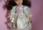 Porcelain Doll on a Stand