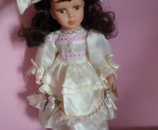 Porcelain Doll on a Stand