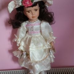 Porcelain Doll on a Stand