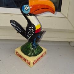 Guinness  toucan  cast iron sign
