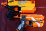 Three small NERF hand guns