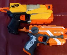 Three small NERF hand guns