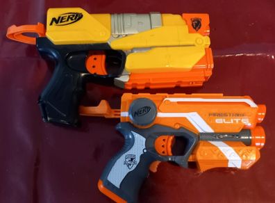 Three small NERF hand guns