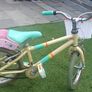 Raleigh Pop 16-inch Kids' Bike in the Cream/Teal Image 3