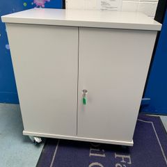 Large laptop storage and charging unit