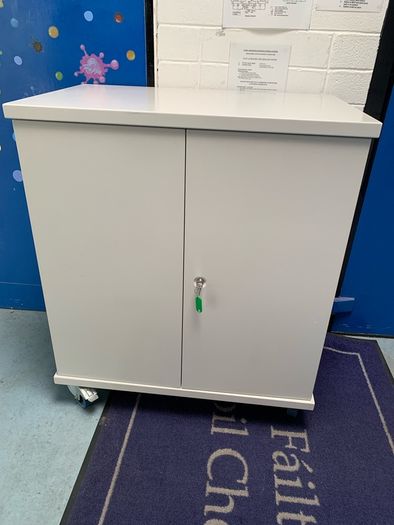 Large laptop storage and charging unit