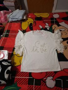 fab new off white top from savida