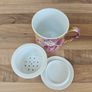 Teacup with Strainer and Spoon Image 3
