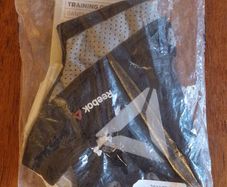 Brand New Unopened Reebok Training Gloves.