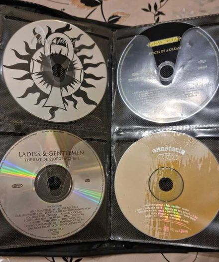 80 CD + Case. All CD's in perfect playable condition.