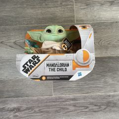 Mandalorian and grogu doll