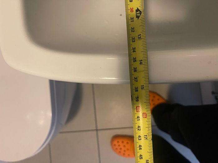 Bathroom sink with tap