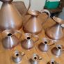 vintage copper measure jug collection Image 2