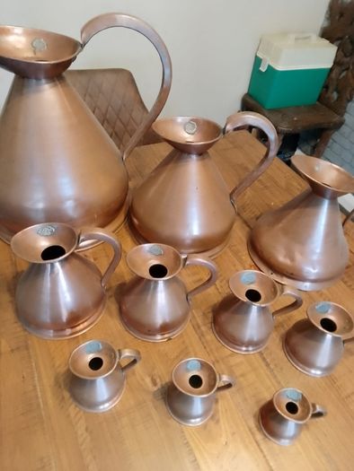 vintage copper measure jug collection