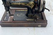 Singer table top sewing machine.