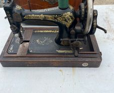 Singer table top sewing machine.