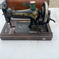 Singer table top sewing machine.