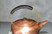 Massive copper kettle with bakelite handle
