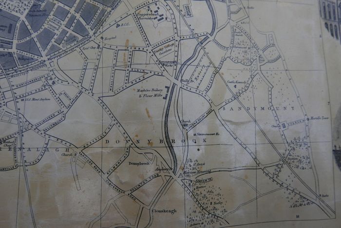 Antique DUBLIN. Map of Dublin & Suburbs with 22 vignettes of Dublin landmarks. Published by Edward Heffernan, 1st June, 1868, 12 Charleville Road, Rathmines. 28" x 22,5". Linen backed. Frayed at edges