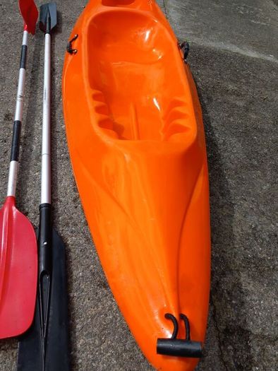 Kayak plus 2 paddles and 2 bouyancy aides
