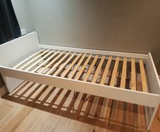 White single bed frame with slatted base