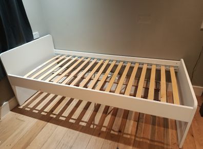 White single bed frame with slatted base