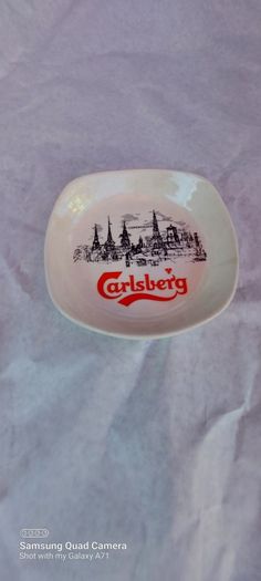 carslberg ashtray,,good condition,,pitting on glaze,,overall good, thank you, collectors item, handy for man cave, home bar etc, if buyer collects cheaper .take as is .