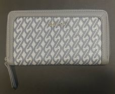 Nine West Ladies Wallet. Mainly grey, fully zipped, inside zipped coin purse and numerous slots for cards