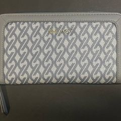 Nine West Ladies Wallet. Mainly grey, fully zipped, inside zipped coin purse and numerous slots for cards