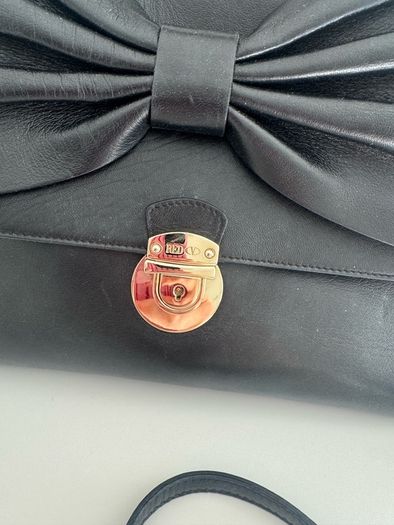 RED V Valentino genuine black leather crossbody bag with large bow and pink interior lining