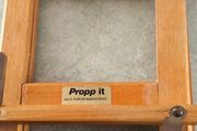 Propp it foldable wooden book holder.