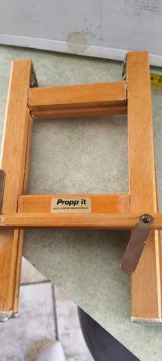 Propp it foldable wooden book holder.