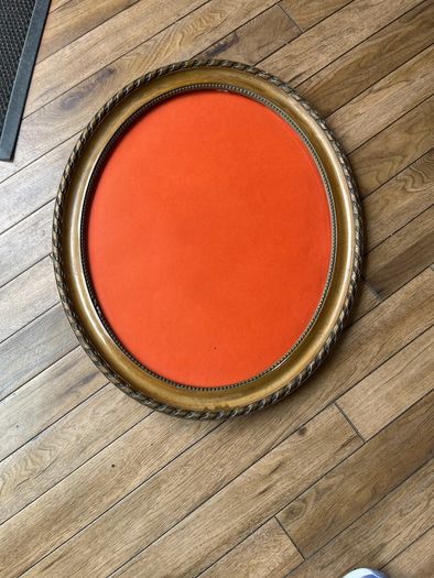 Antique Oval Gold picture frame with decorative rope & twist moulding