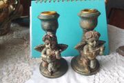 Two Churub Candlesticks