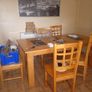table chairs.   fridge.  unit sofa Image 4