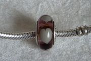 Pandora violet/purple murano glass charm with grey/Wlwhite hearts very good condition