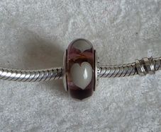 Pandora violet/purple murano glass charm with grey/white hearts very good condition