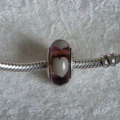 Pandora violet/purple murano glass charm with grey/Wlwhite hearts very good condition