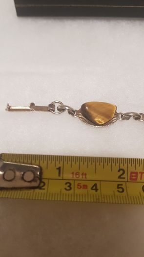 tiger eye bracelet,,good condition,buyer collects or pays postage, thank you, take as is,see pictures for condition