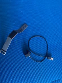 Fitbit charge 3 with a charger