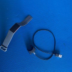 Fitbit charge 3 with a charger