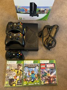 Xbox 360 with games and controllers