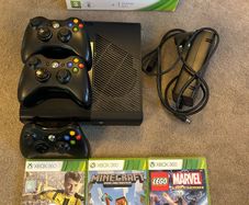 Xbox 360 with games and controllers