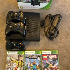 Xbox 360 with games and controllers