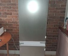 Integrated fridge freezer