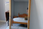 Large gold effect distressed effect mirror