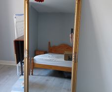Large gold effect distressed effect mirror